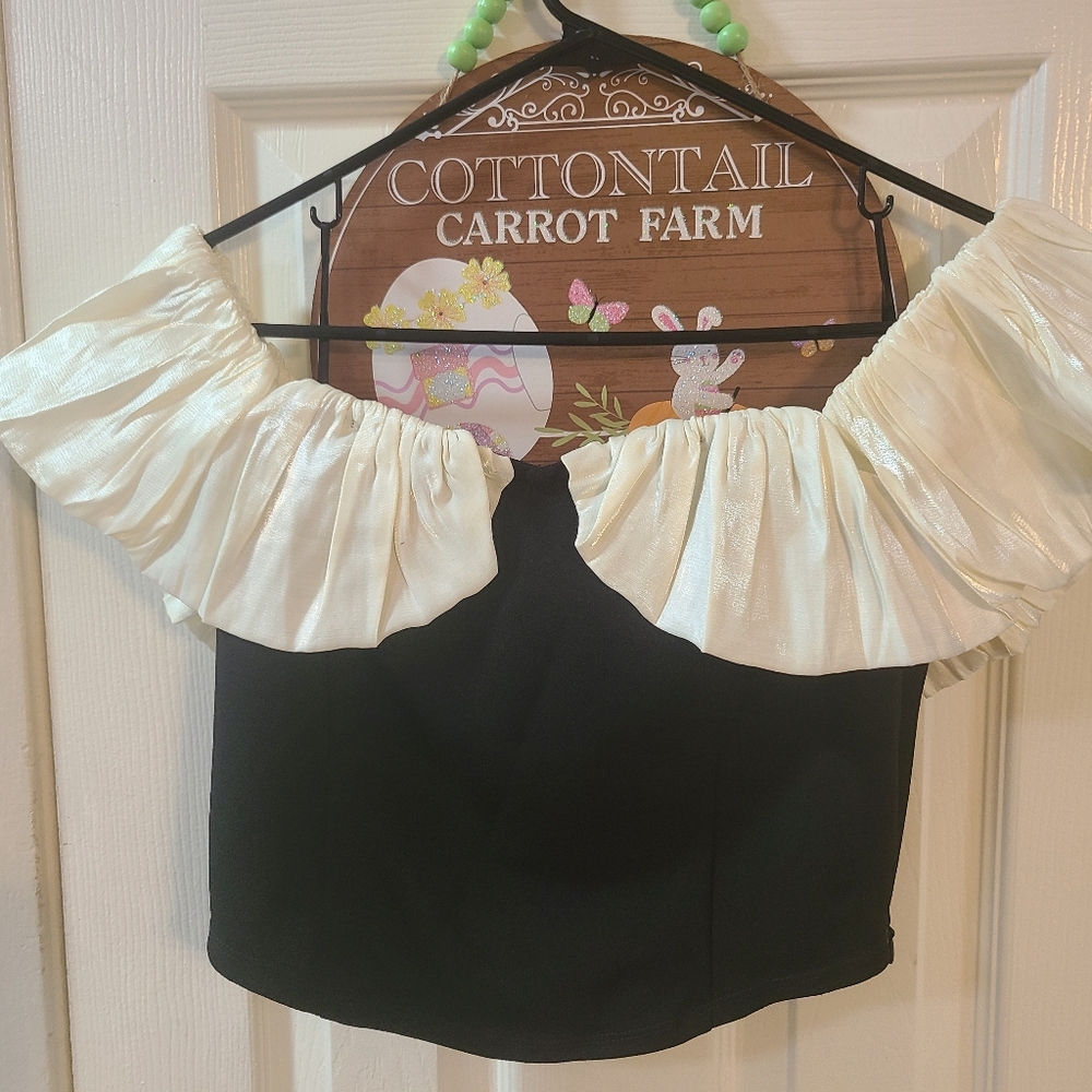 Elegant Black and Cream Off-Shoulder Top